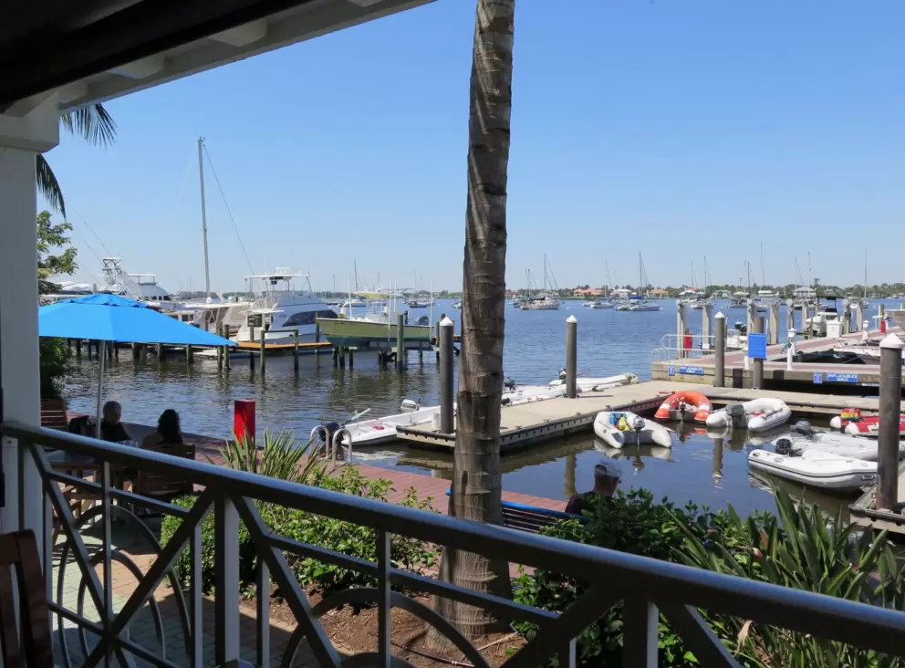 View of the blue marina, at Gilbert's Coffee Bar.