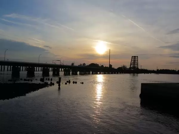 Sunset over the railroad bridge.