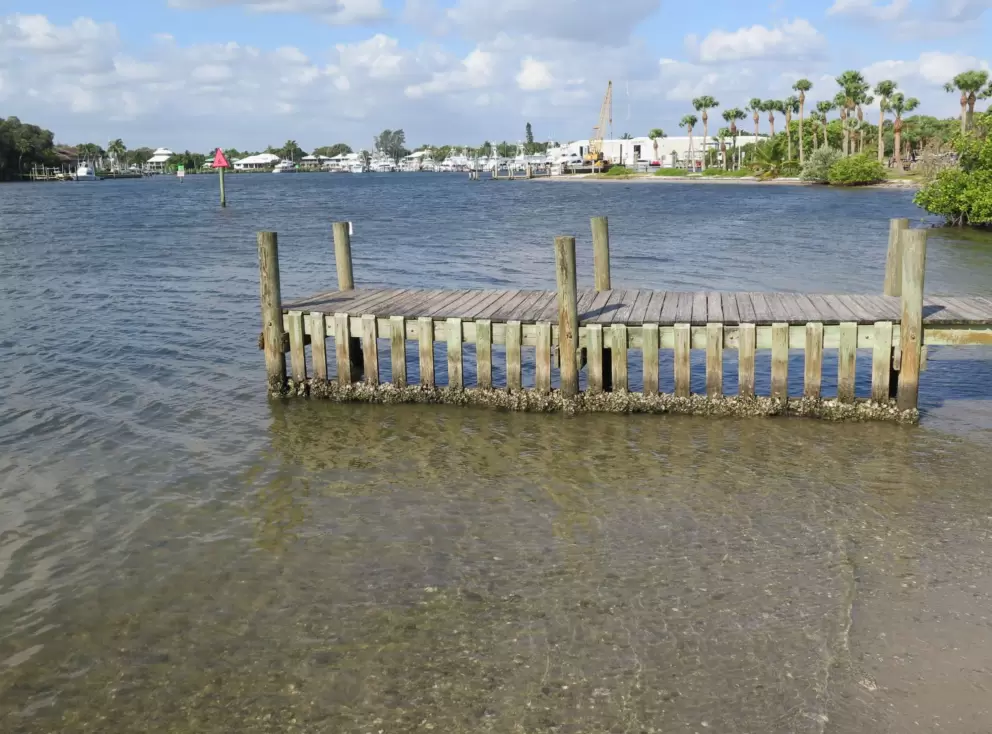 Little dock with crystal clear water.