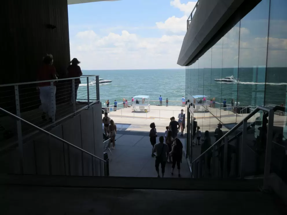 You can stand in the shade and watch the water, at the building at the very end of the pier.