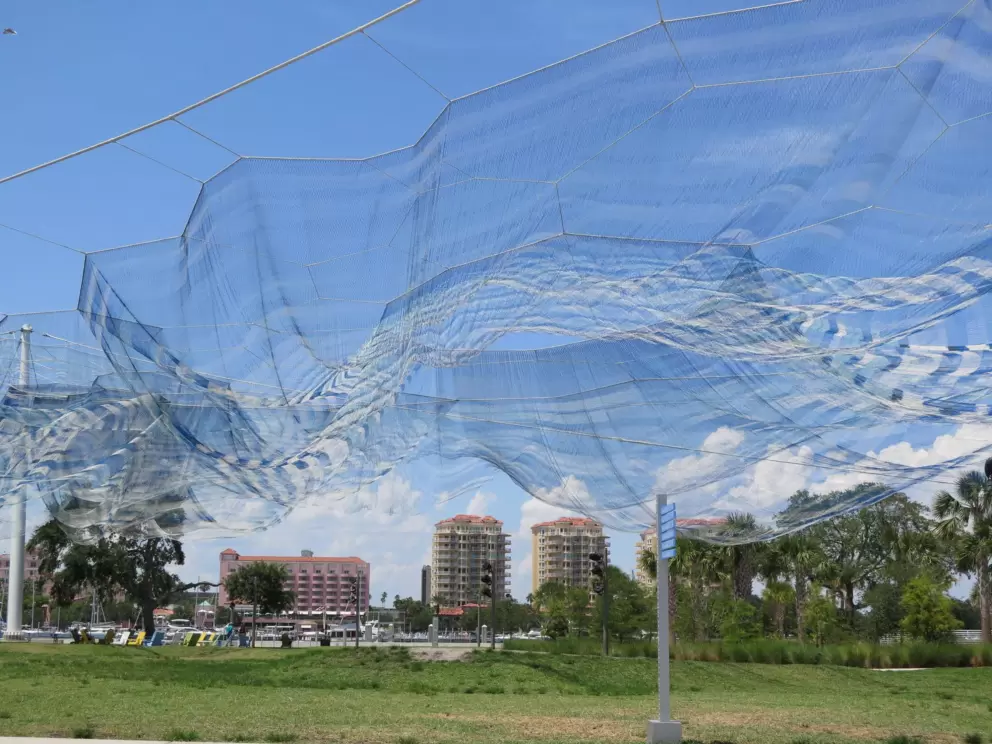 A gigantic web in the sky, above the lawn near the playground!