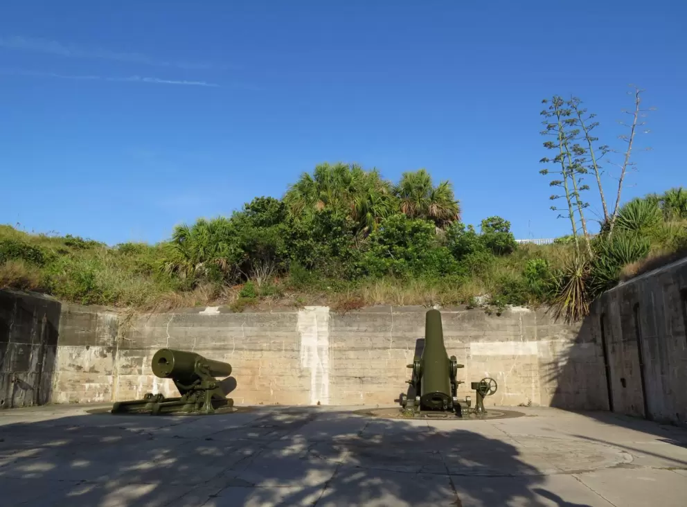The mortars, hidden by a wall.