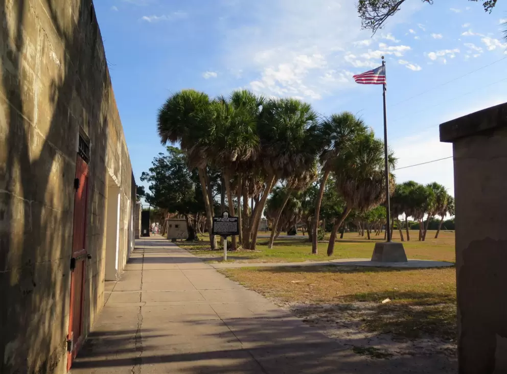 The flag and fort wall.
