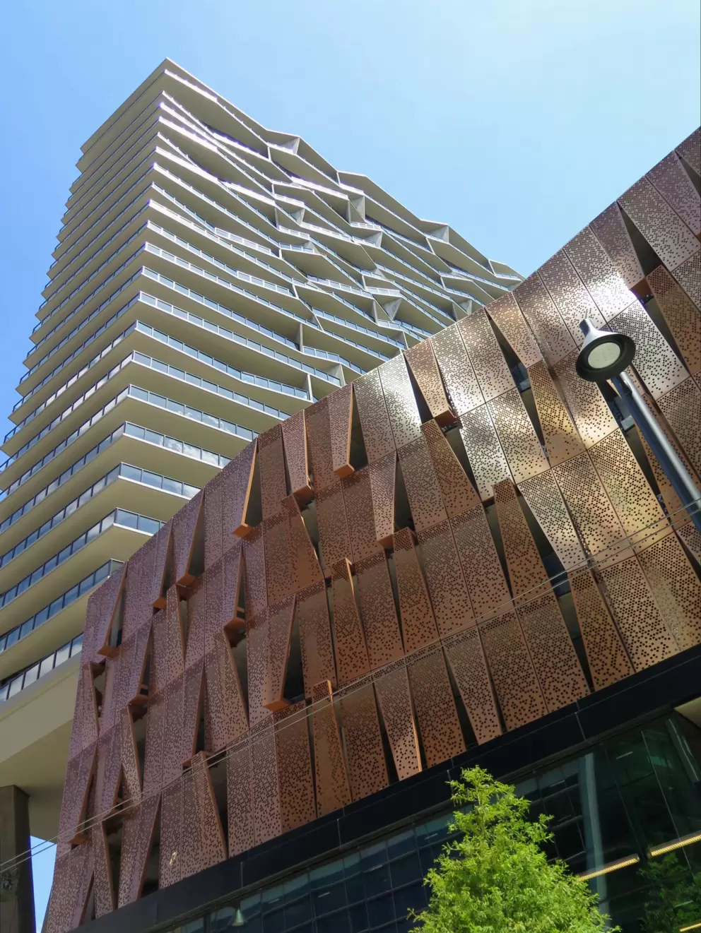 Shiny metallic building near the aquarium.