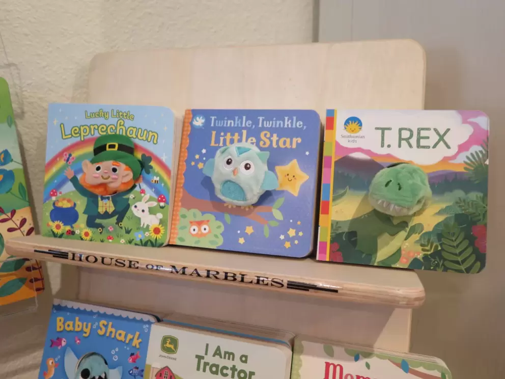 Storybooks with finger puppets inside at Primrose Gift Shop.