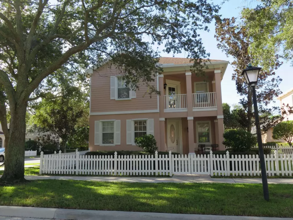 Pink house across from the playground. I like this house!