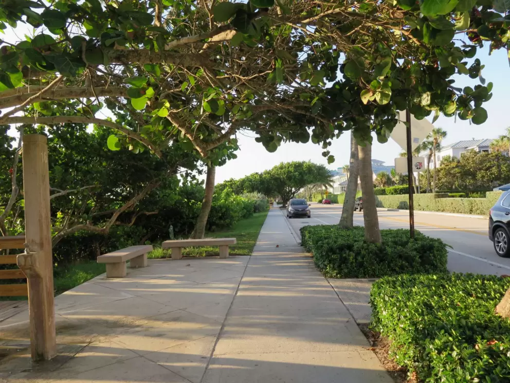 Shower and benches along Ocean Drive, at a beach entrance.