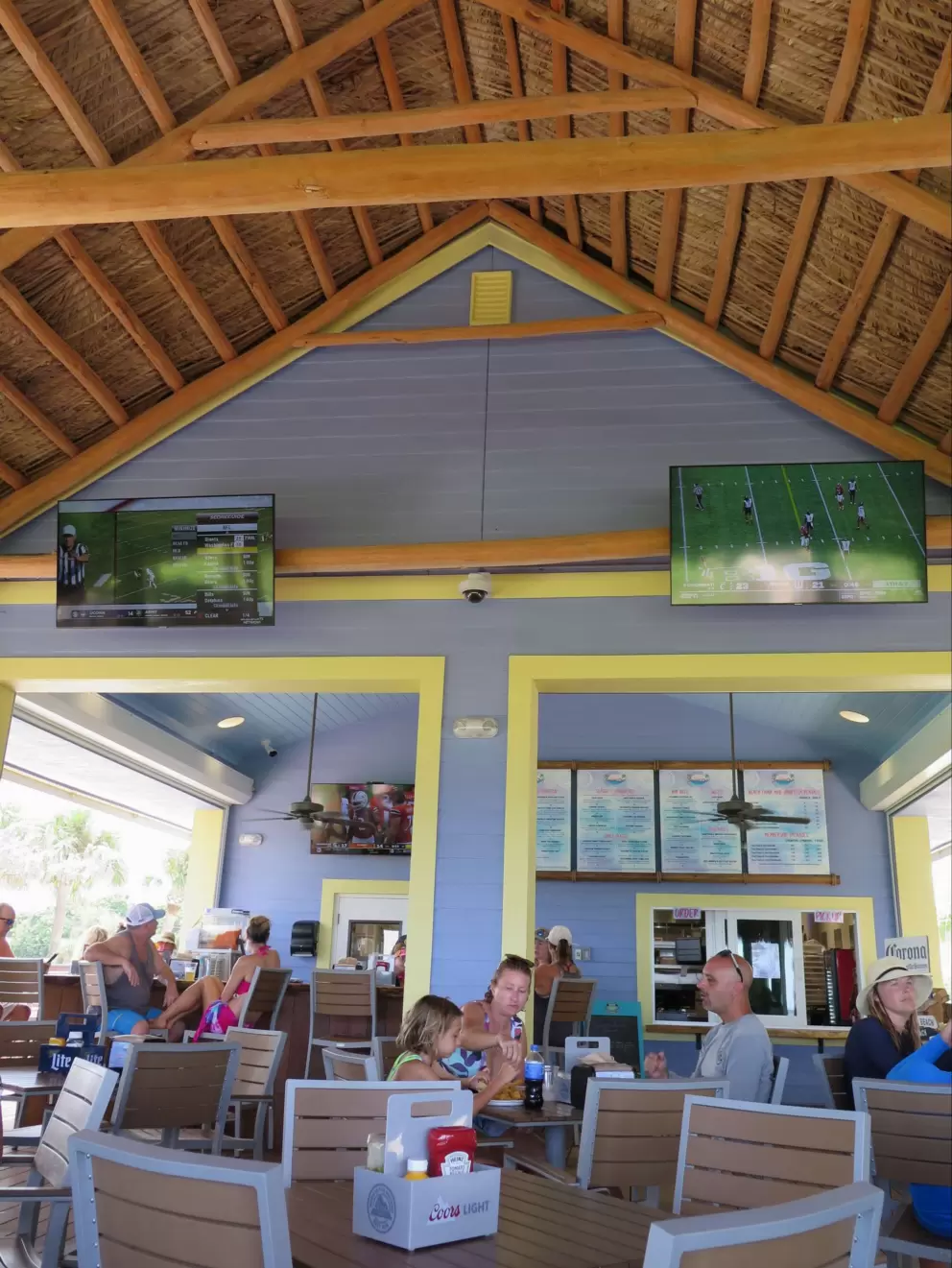 The thatched roof and shady seating at Seaside Cafe. 