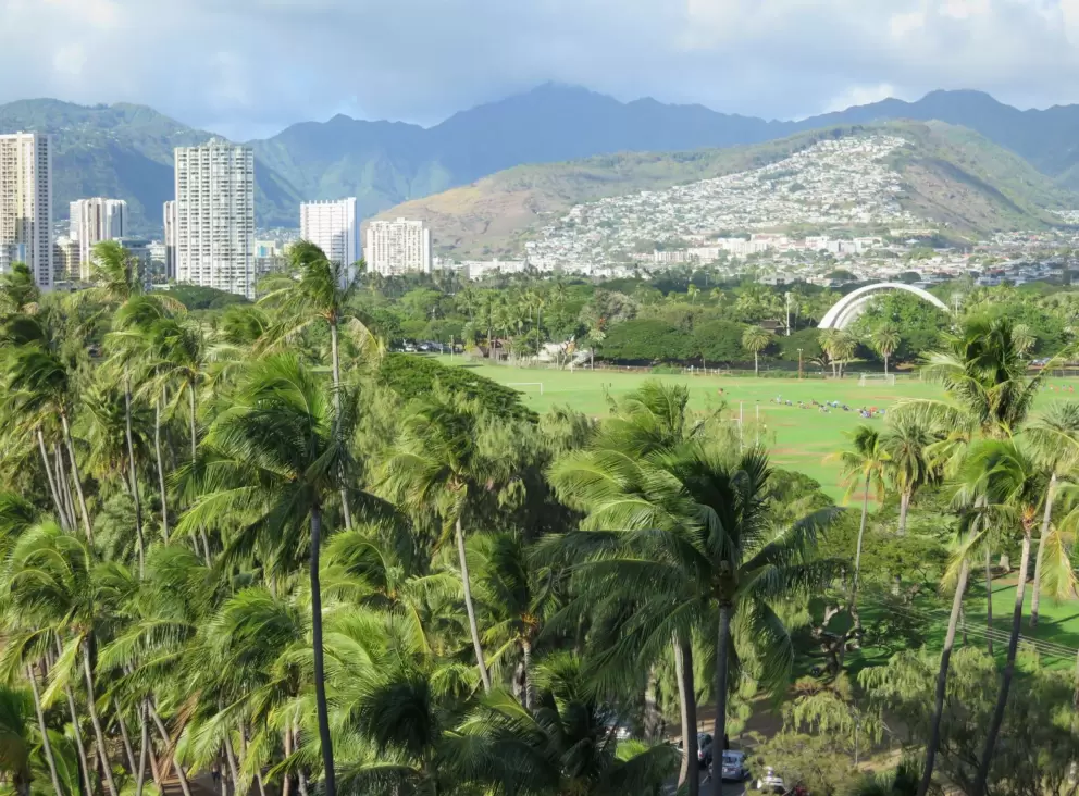 Kapiolani Park and the mountains behind it, as seen from Kaimana Beach Hotel. 