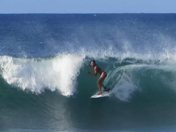 Closeup of female surfer during Haleiwa Challenger 2021.