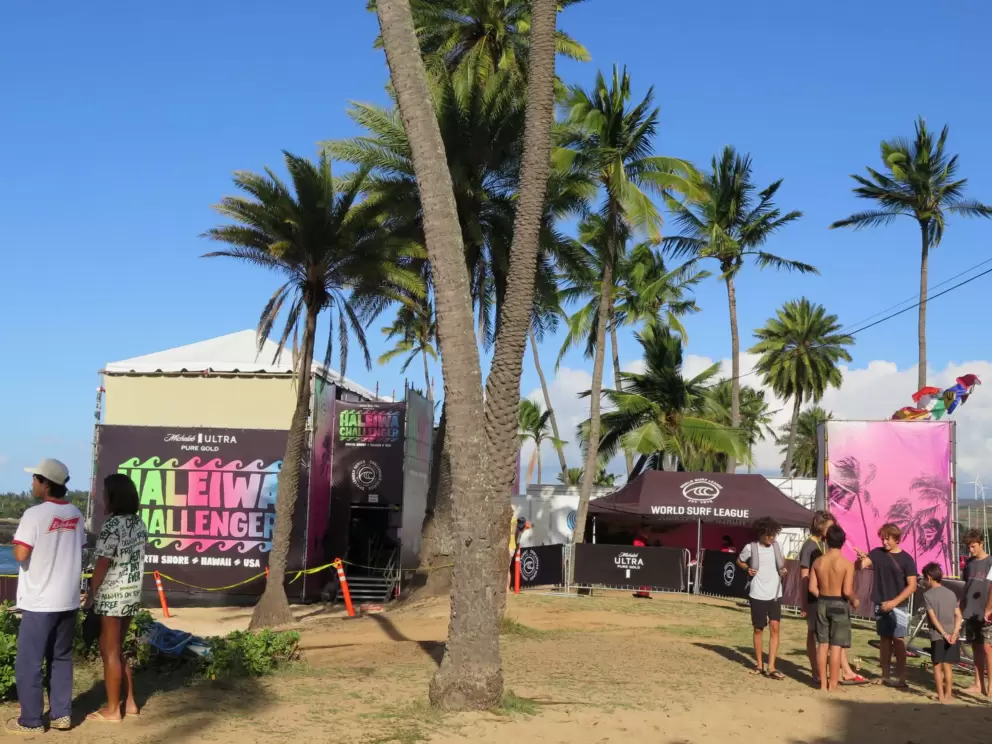 Boys hanging out at the surf contest.