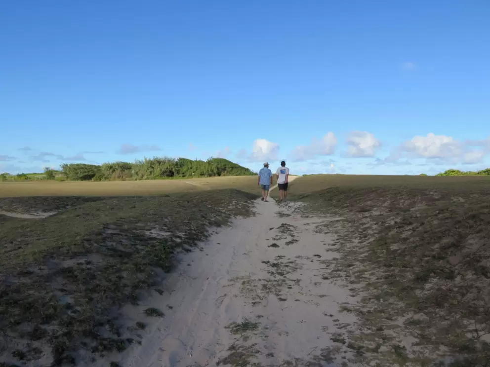 The path that runs along the west side of the golf course.