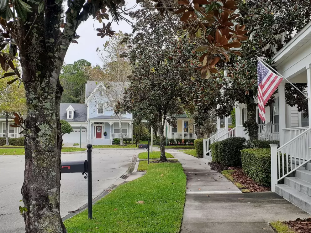 Adorable street corner when you first get out of the forest behind the church. This is Pondview Court.