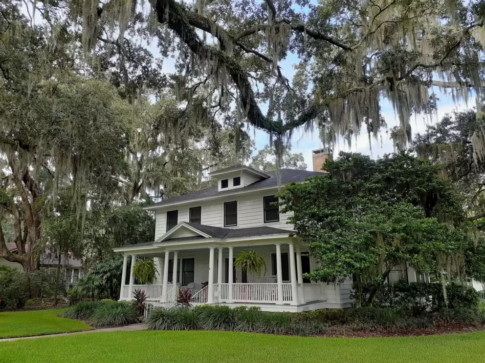 Oak and Spanish moss, and an elegant balcony.