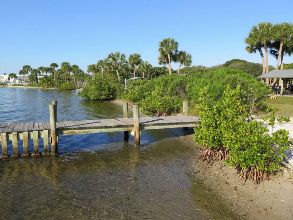 Little dock over clear water.