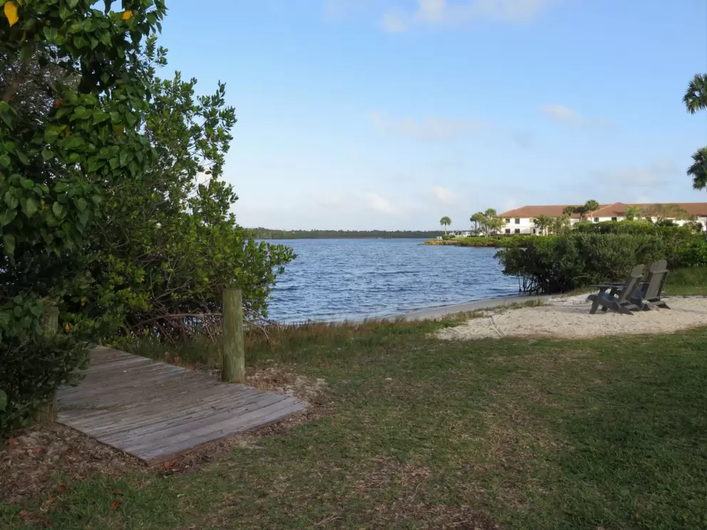 Grassy spot where the dock begins, on Miles Grant Rd.