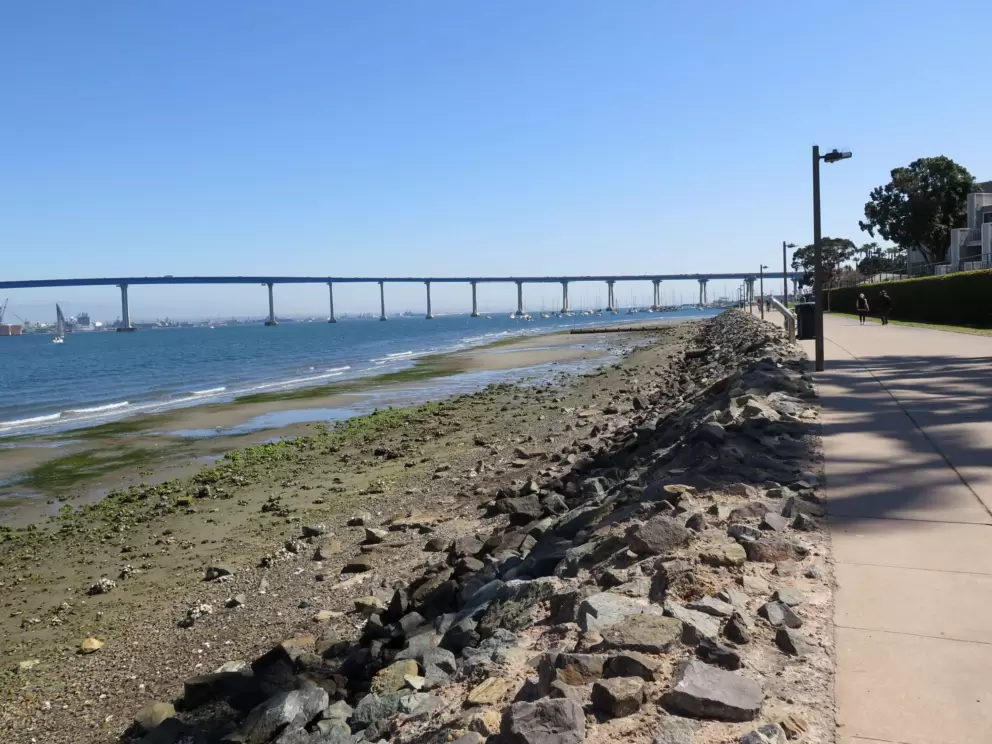 The path runs along the water.