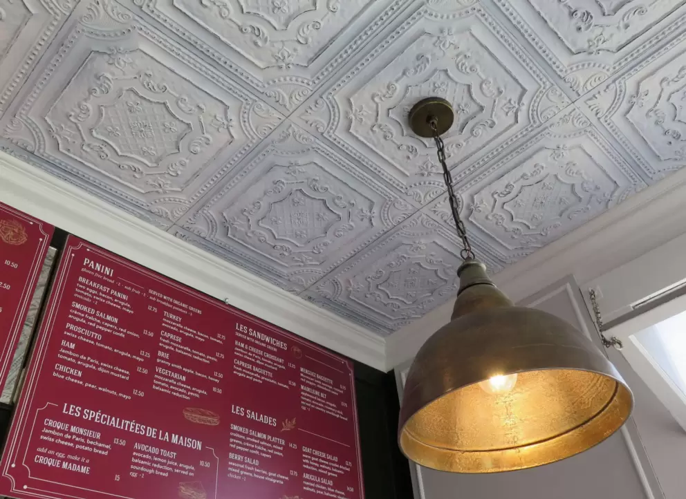 Ornate tile ceiling in Cafe Madeleine. 