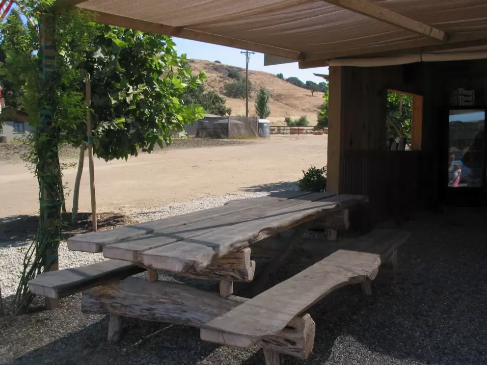 A shady spot to sit, at the front booth. 