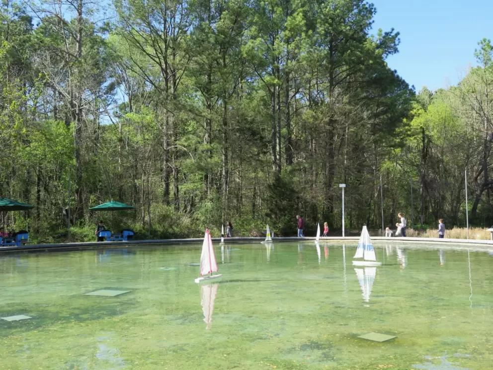 Playing with the mini sailboats.
