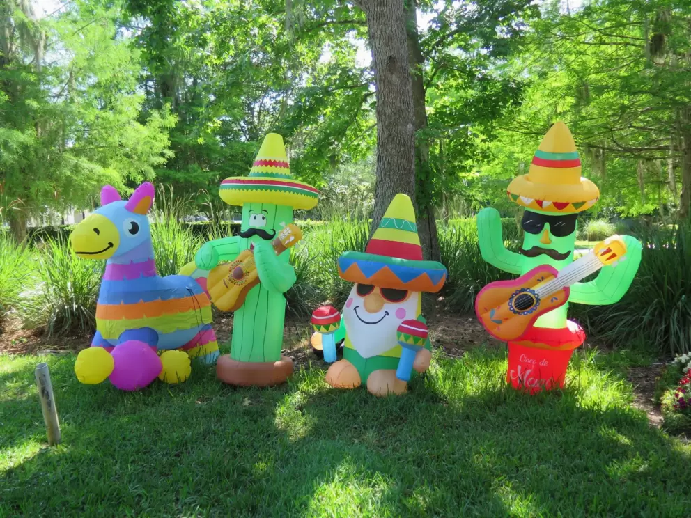 Cinco De Mayo decorations at a house near the path entrance.