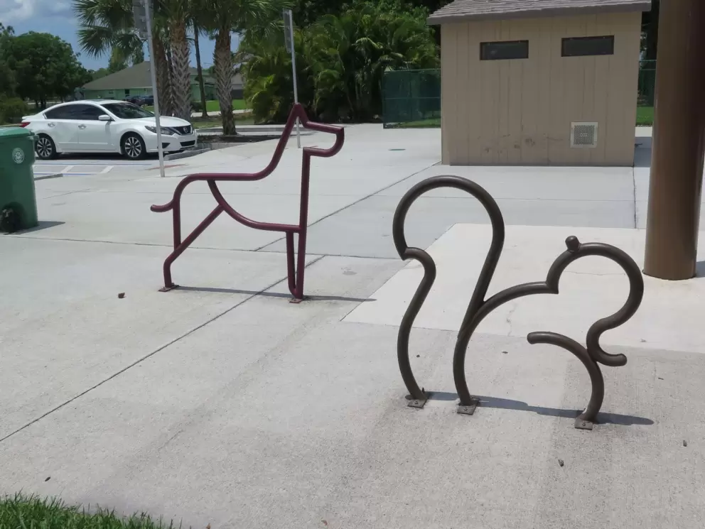 Lock you bike at the squirrel and dog!