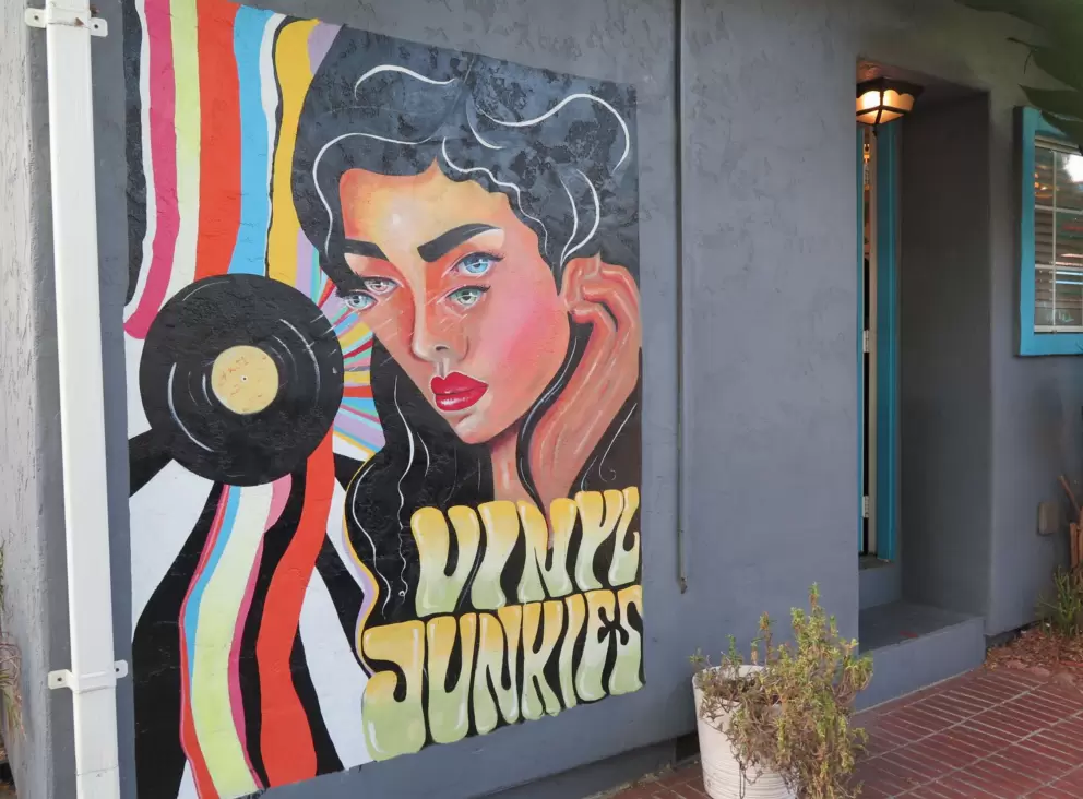 Mural outside a record store.