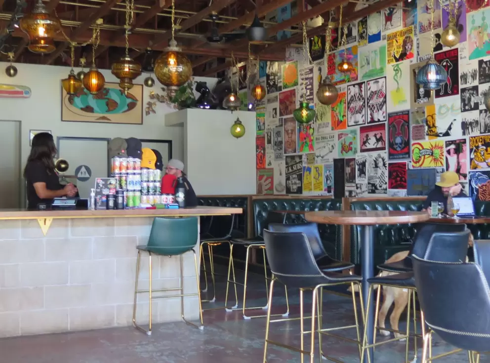 A cafe with tinted glass drop lights.