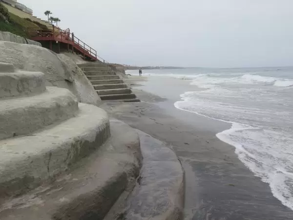 Concrete where the cliff eroded.