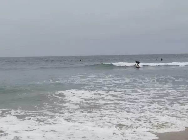 Surfing the waves.