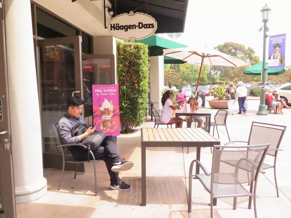 Sitting outside Haagen-Dazs.