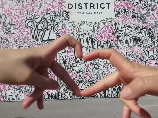 Love Conquers Wall behind Grandview Market. It is great for selfies!
