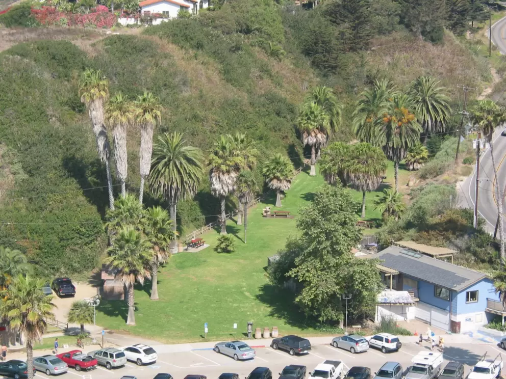 View of sheltered little park at Hendry's Beach, as seen from Douglas Preserve.