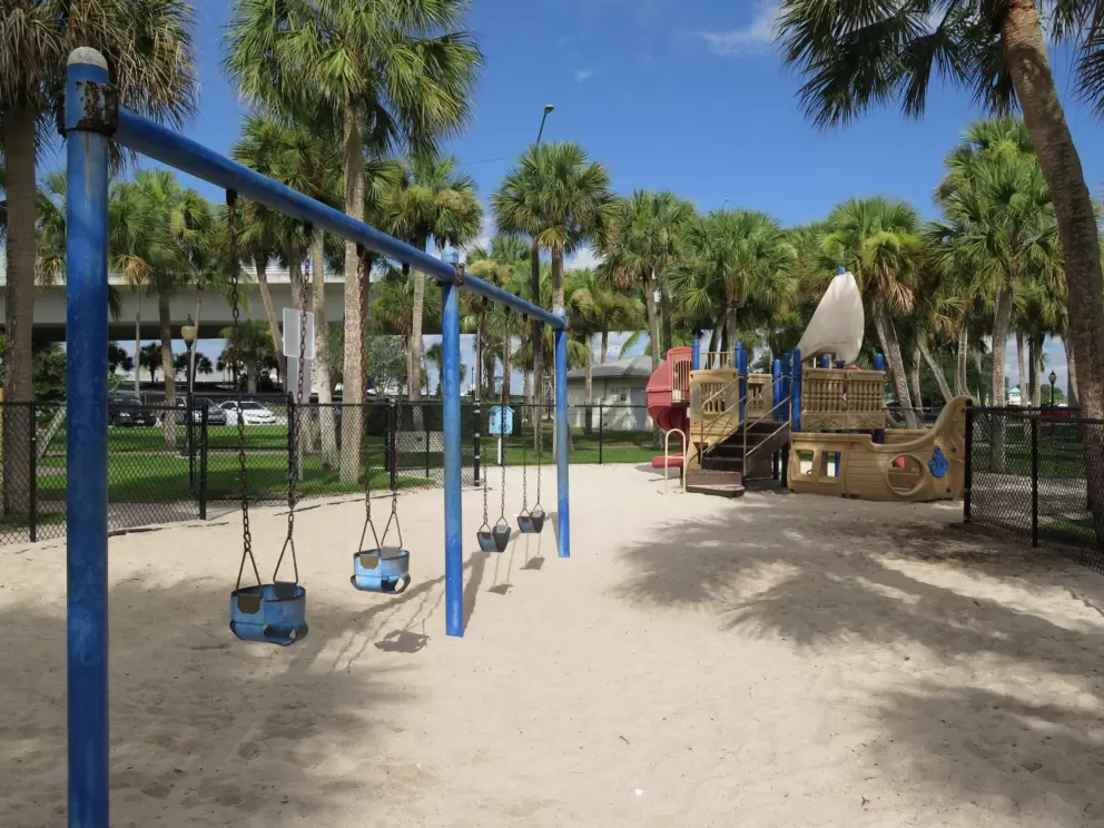 Baby swing and regular swing, plus ship playground at Flagler Park, along the way. 