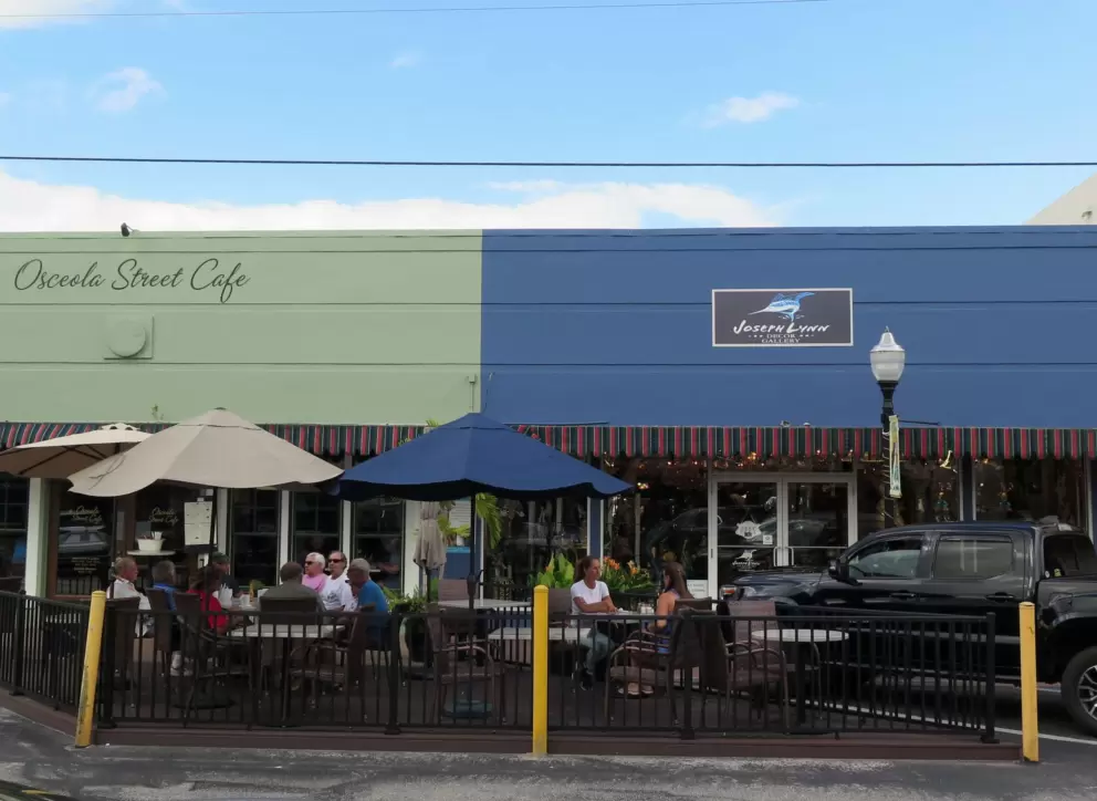 Osceola Street Cafe, with umbrellas outside. 