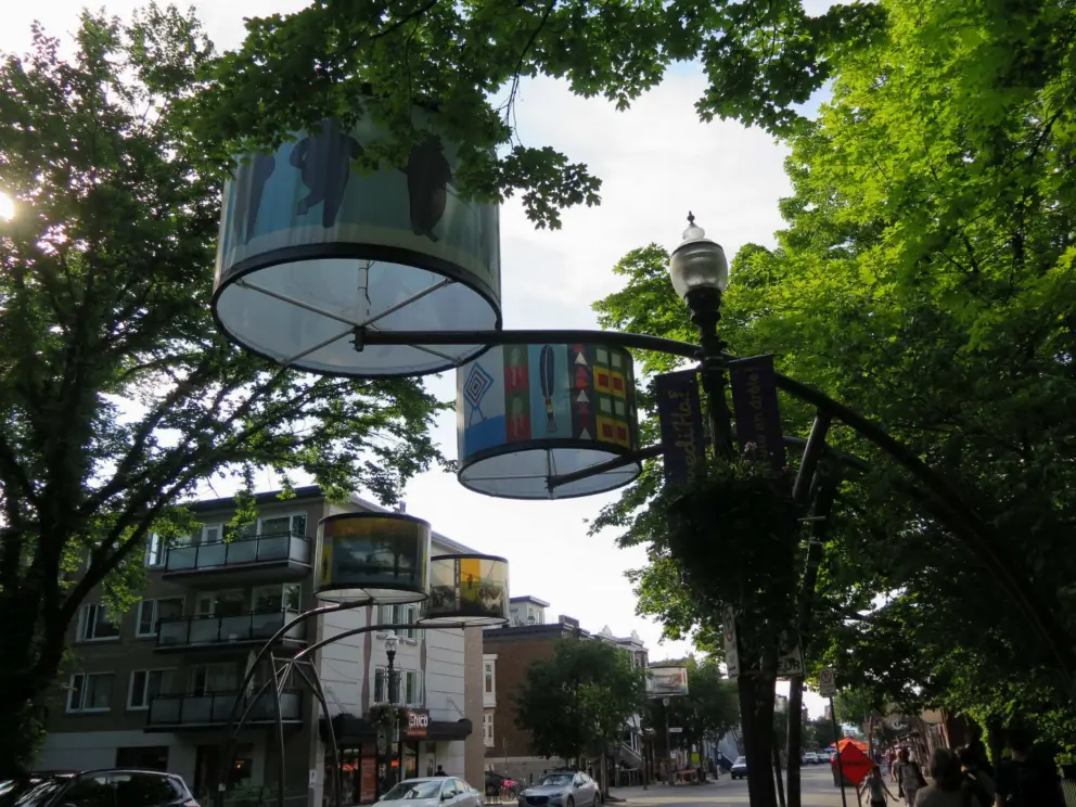 Colorful lanterns along the street, and lovely trees.
