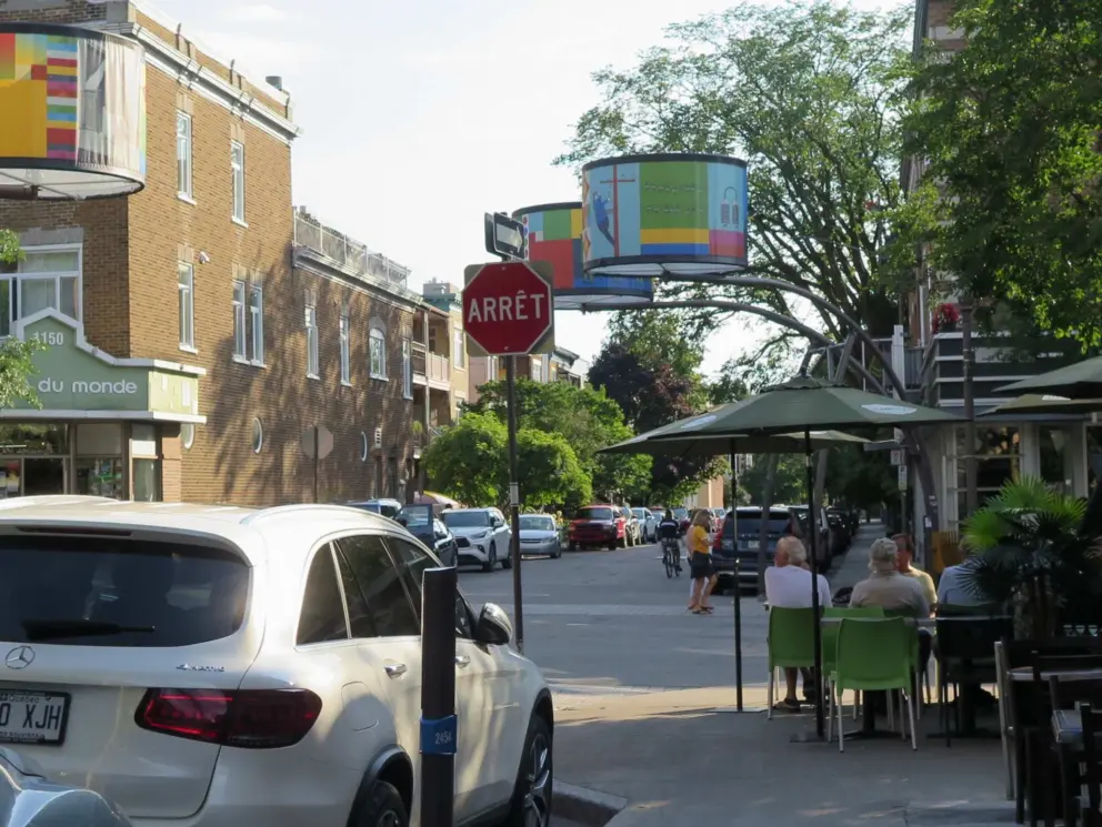 Colorful lanterns and outdoor cafes.