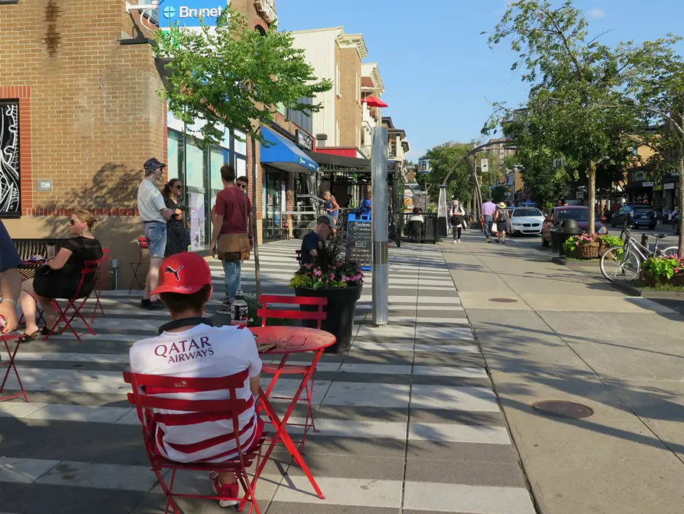 Seating outside Chocolats Favoris.