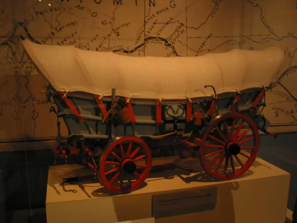 Model of a covered wagon, on the Heroes exhibit.