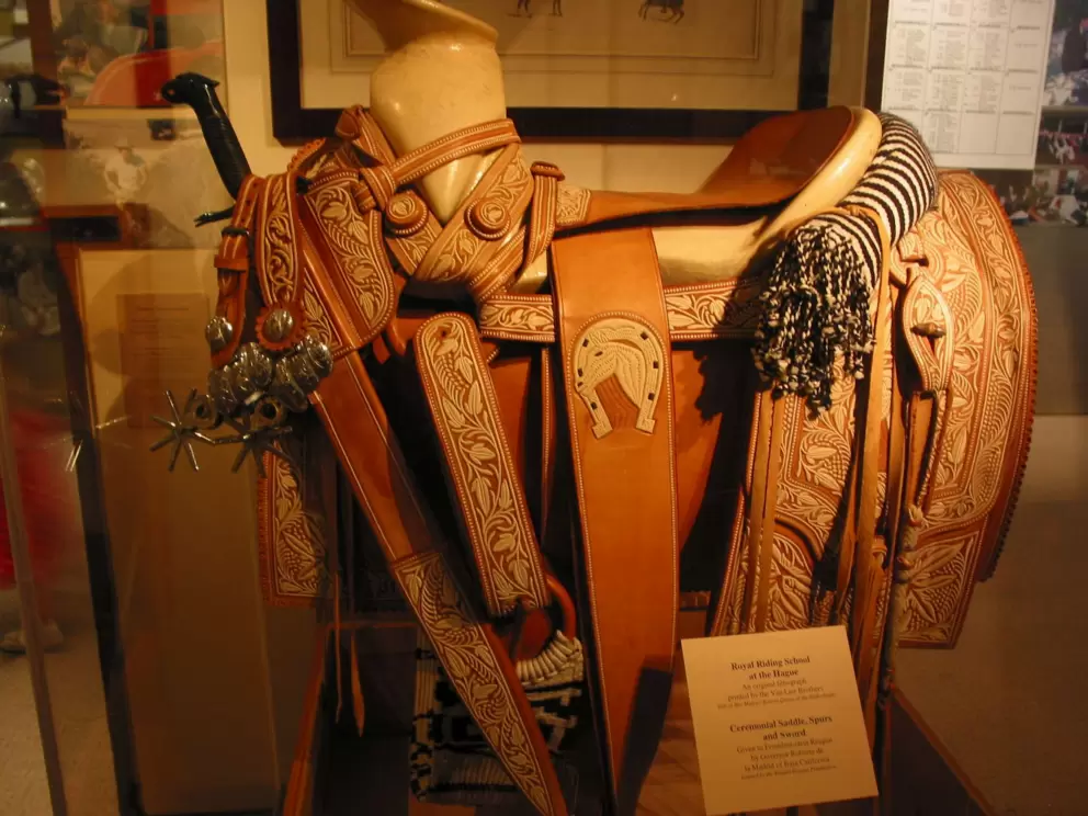 Ceremonial saddle, spurs, and sword. Given to Reagan by Governor Roberto de la Madrid of Baja California.