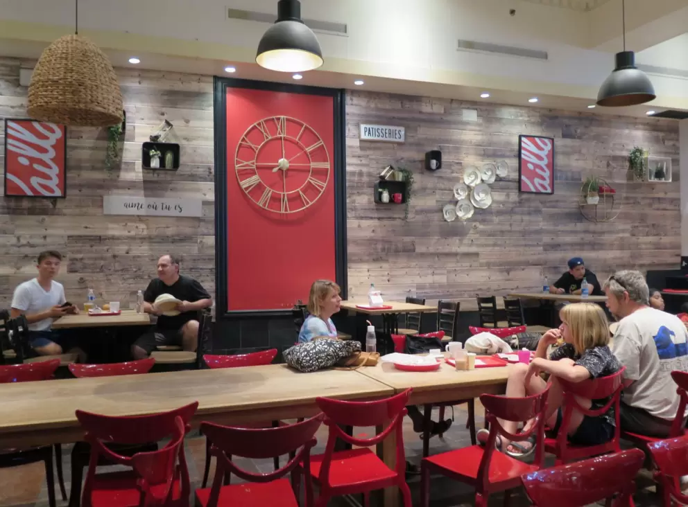 The interior of Paillard, a pastry shop with salads, quiche, and sandwiches. 