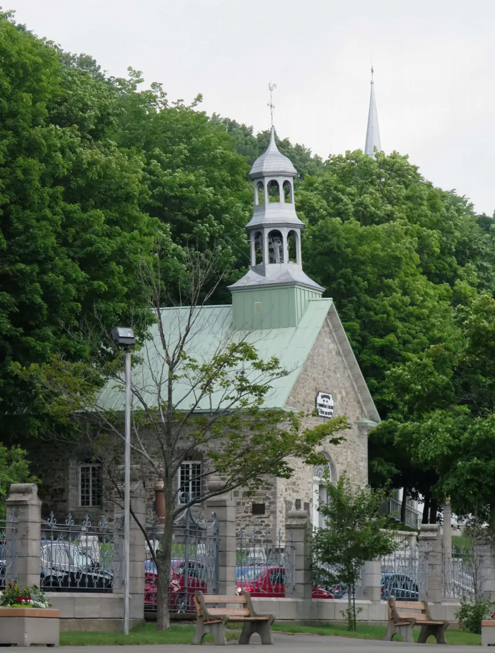 Souvenir de la Troisieme Eglise, built 1878, a little chapel by the hillside, with the 1676 steeple from the old church.