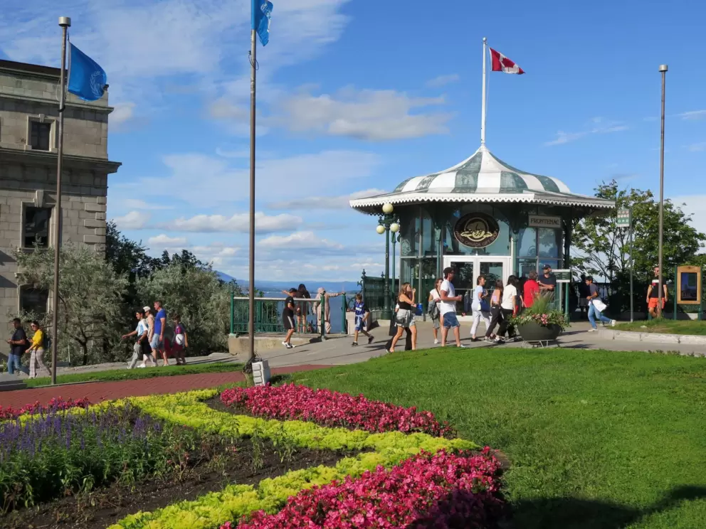 The kiosk and flower beds. 