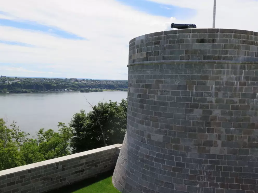 A canon aimed at the river.