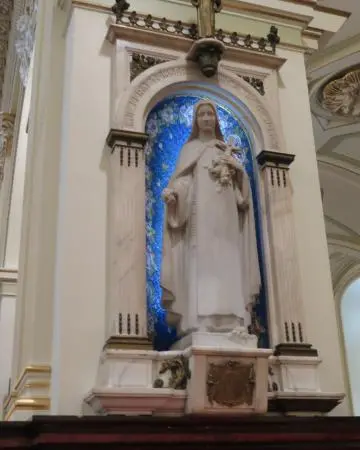 Mary, at the entrance.
