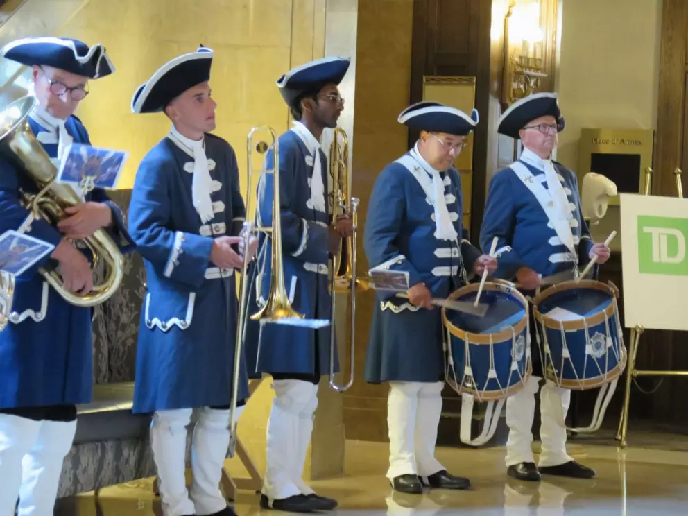 A brass band playing in the chateau one afternoon.