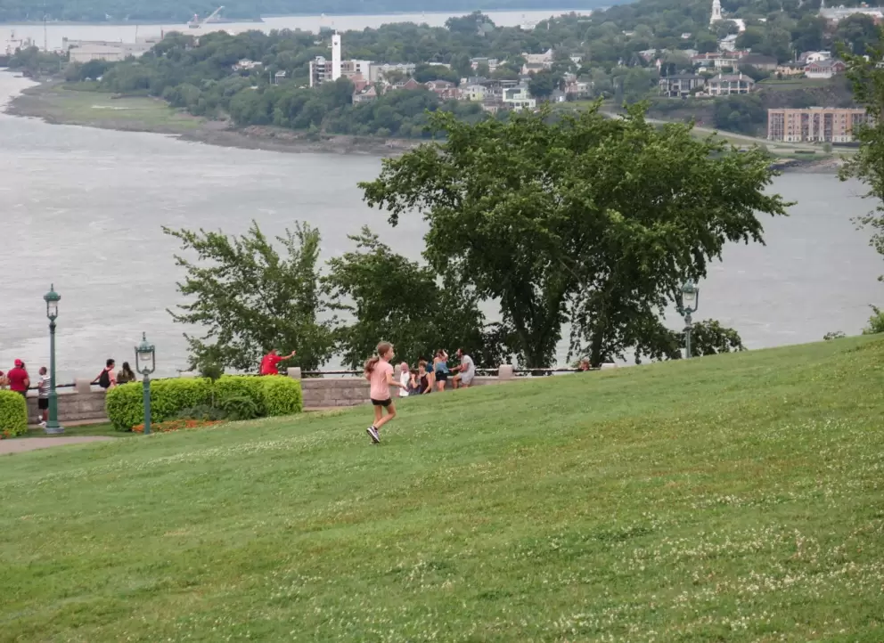 Kids adore being on top of a hill. 