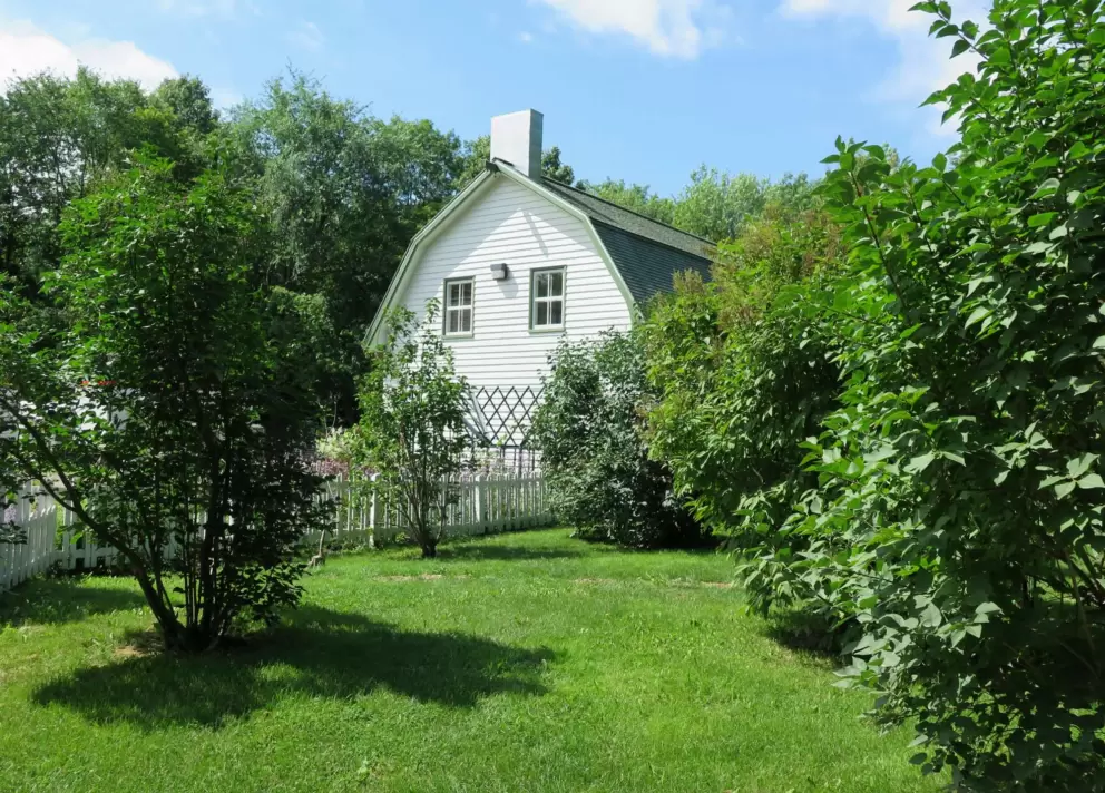 Farmhouse and blue sky. 