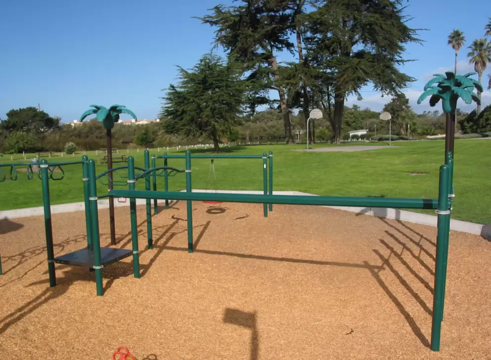 Cypress trees set the backdrop for Oceano Park. 