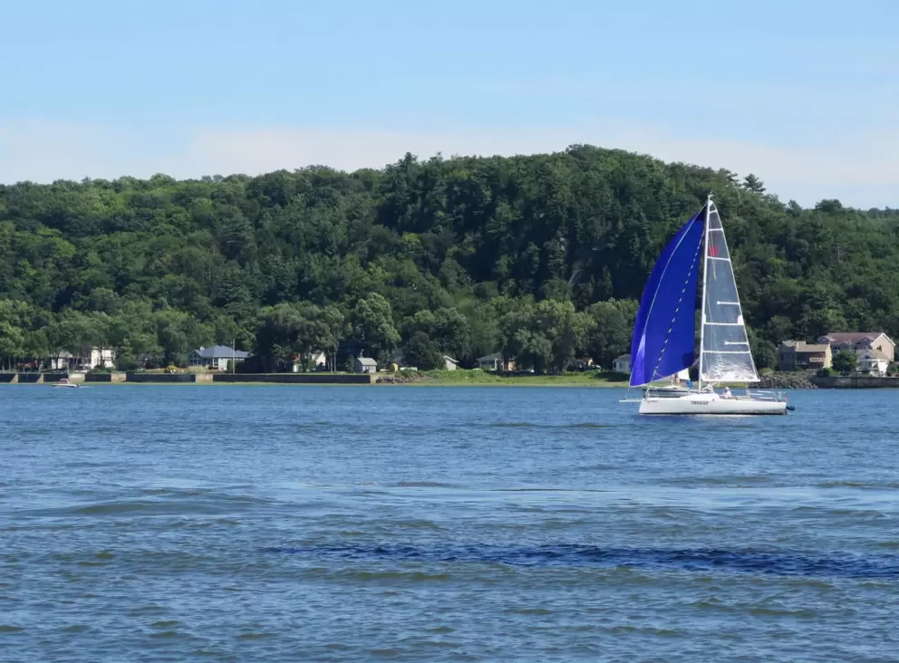 Blue and white sailboat. A pretty sight!